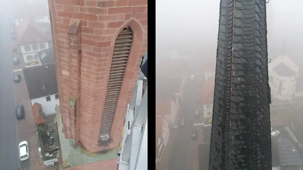 Blitzschutzarbeiten am Kirchturm in Bellheim mit Hubsteiger in großer Höhe